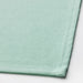 A close-up of a light turquoise and green napkin 40545928            