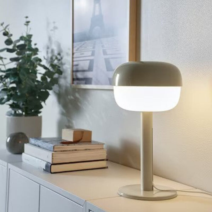 "IKEA's 36 cm beige table lamp providing bright light for reading  70520931    