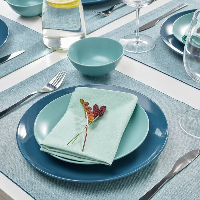 A eye-catching napkin in  green-blue hues, adding a playful and fun touch to your dining decor 40545928            