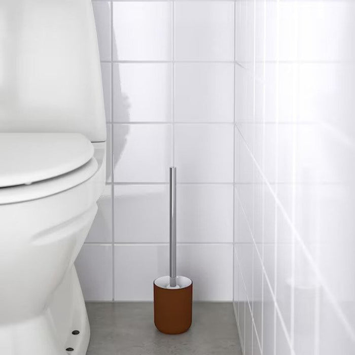 Bathroom accessory set for small spaces: A set of four brown bathroom accessories including a toothbrush holder, soap dish, soap dispenser, and toilet brush, designed to fit in small bathrooms.
