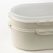 A clear plastic lunch box with two compartments, designed to be stacked on top of each other 10518653          