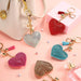 A dazzling heart-shaped key chain with iridescent crystal