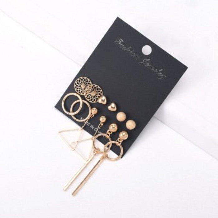 A set of hoop earrings with a textured surface and a trendy, bohemian vibe.