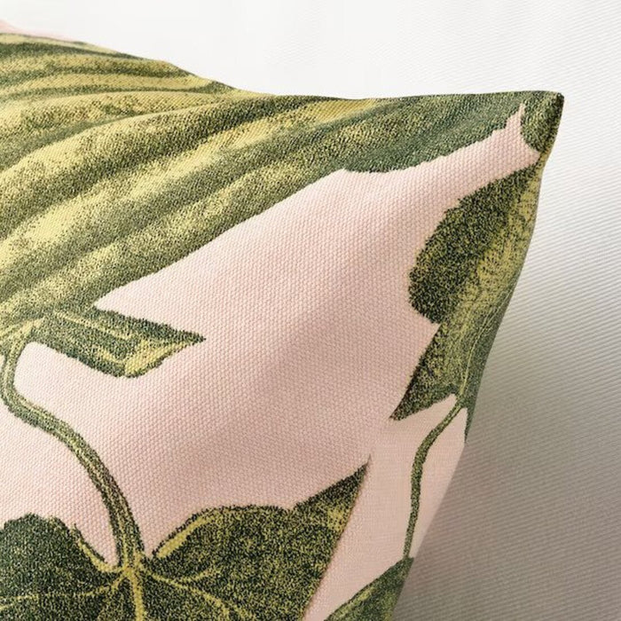 A decorative light pink/green cushion cover, suitable for any home interior, made by IKEA 30542992 
