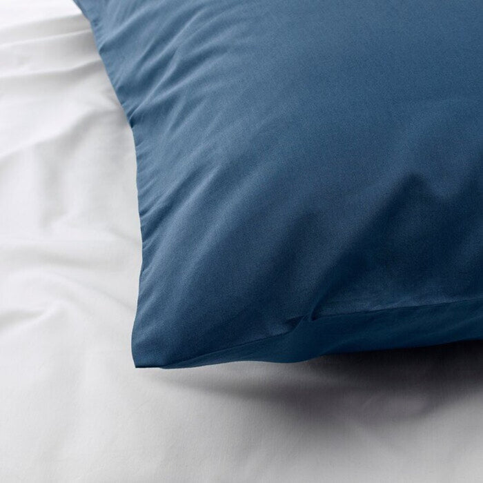 The edge of a white pillowcase from IKEA, highlighting its bright and cheerful color 30337029