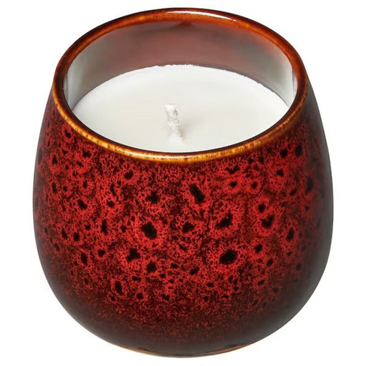 A soy wax candle in a frosted glass jar, emitting a soft fragrance of lavender-90519314        