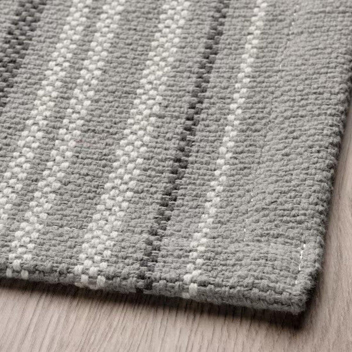 Add a touch of sophistication to your space with this grey and white striped flatwoven rug, 50x80 cm-40539574