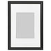 A sleek photo frame with a white mat, perfect for displaying your favorite memories 70387121