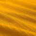 Digital Shoppy IKEA An image of an IKEA washcloth in golden-yellow. The cloth is draped over a towel rack, and its soft texture and absorbent properties are visible.