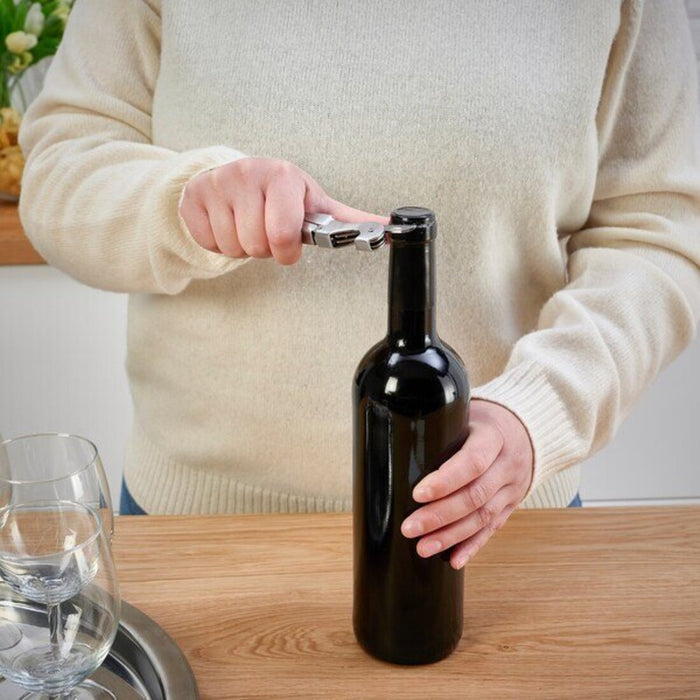 A compact, pocket-sized corkscrew with a folding design, shown in a closed position on a white background."40531549                    