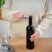 A compact, pocket-sized corkscrew with a folding design, shown in a closed position on a white background."40531549                    