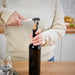 The background is blurred and out of focus, drawing attention to the corkscrew."-40531549                    