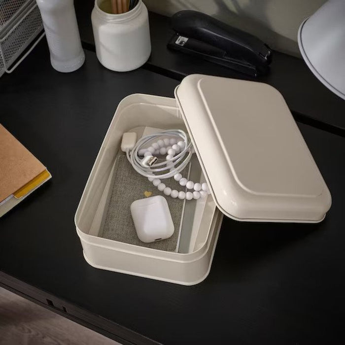 Maximize your space with the IKEA light beige storage box with lid. Its compact size and stackable design make it a great storage option for small spaces-Digital Shoppy IKEA 