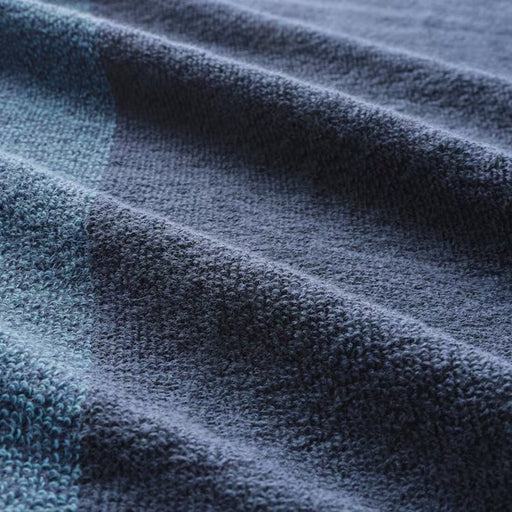 Soft and absorbent bath towel in dark blue/mélange color 90442904