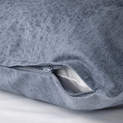 A cushion cover from IKEA has a hidden zipper that makes the cover easy to remove