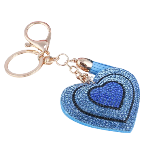 A detailed image of a heart-shaped key chain made of crystal