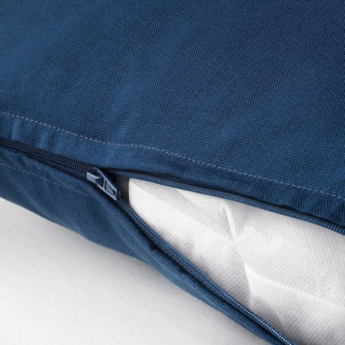An image of an IKEA cushion cover with a dark blue color showcasing its soft texture and hidden zipper 80426202