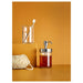 Elegant and practical soap dispenser with a modern chrome and glass design 00328979