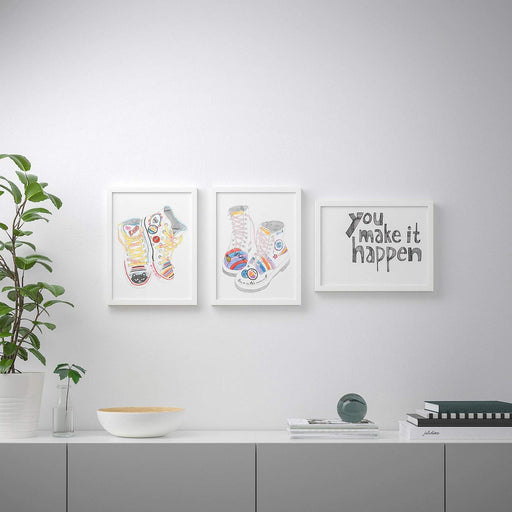 An image of the posters from IKEA's 3 pack set, arranged in a stylish and modern gallery wall. 80448195