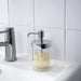 Stylish and practical soap dispenser made of transparent glass and high-quality chrome plating 00328979