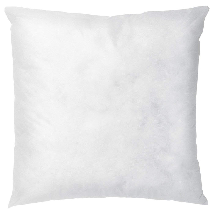 A white cushion pad from Ikea being cleaned with a damp cloth, demonstrating its easy-to-clean and maintain qualities 60415822