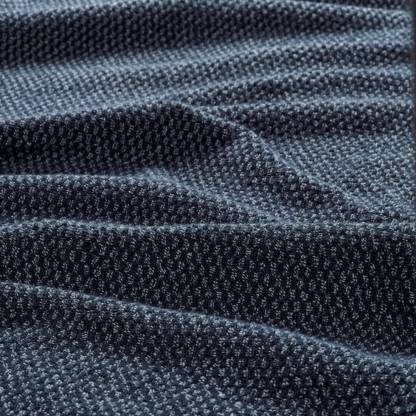 A close-up image of an IKEA hand towel in dark green with a soft and absorbent surface 30490177