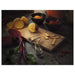 An IKEA peeler lying on a cutting board ready to peel  60324365