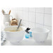 Image of the mixing bowls in use: "The white IKEA mixing bowls being used to mix ingredients for a recipe." -30421792