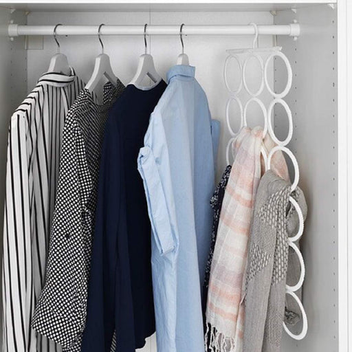  IKEA KOMPLEMENT white hanger organising scarves and accessories neatly inside a closet
