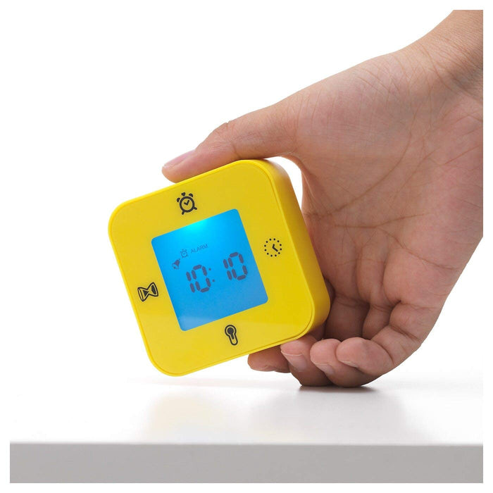 An IKEA alarm clock with a built-in snooze button 00384828