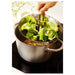 IKEA's stainless steel folding steamer basket, with a caption highlighting its durability and ease of use for steaming vegetables and other foods.