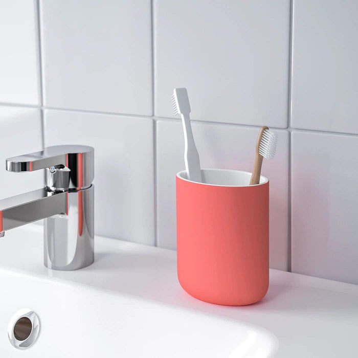 A toothbrush holder made of durable stoneware from IKEA 00444813