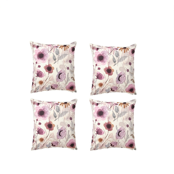 A close-up of a cushion cover with a modern floral pattern in shades -00548194