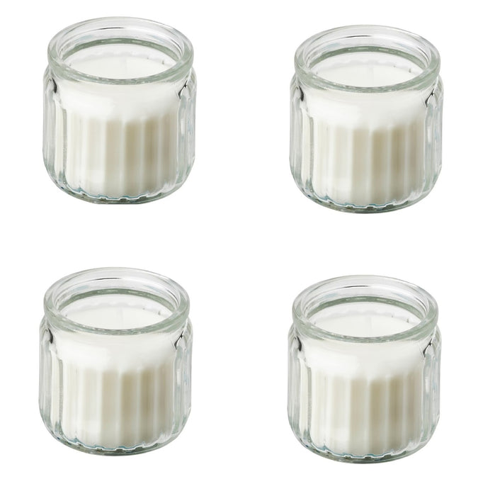 An image of a scented candle in a glass jar from IKEA, featuring a warm and inviting fragrance that soothes the senses.