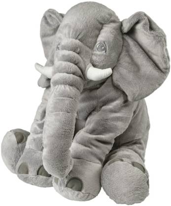 The IKEA Soft Toy Elephant standing on its hind legs, with its front legs outstretched in a playful pose.