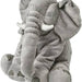 The IKEA Soft Toy Elephant standing on its hind legs, with its front legs outstretched in a playful pose.