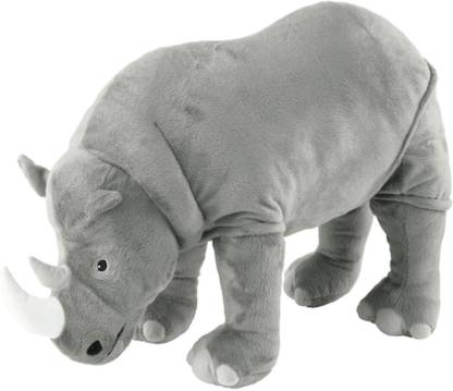 The IKEA Soft Toy Rhino in a playful pose, with its legs bent and its head turned to the side.
