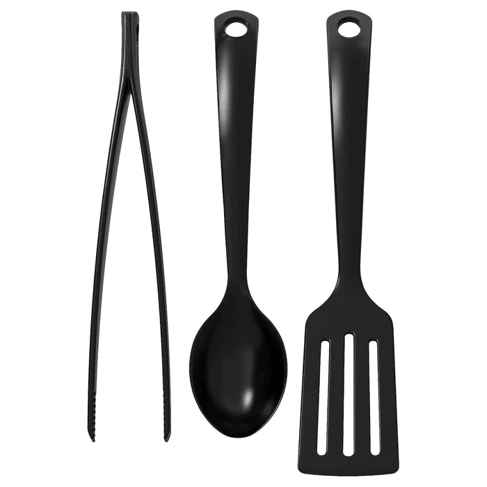 IKEA kitchen utensil set with a black handle heads, including a ladle, slotted spoon, solid spoon, pasta server, and a whisk. 