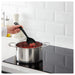 IKEA ladle with a black handle and a deep, round bowl made of stainless steel."