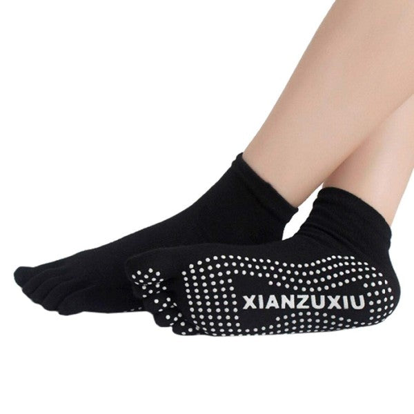 A pair of non-slip, breathable yoga socks with five finger toe design for maximum flexibility and grip.