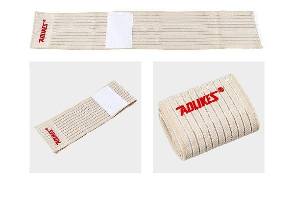  Elastic Sport Bandage Wristband wrapped around their wrist. Alt text: "Person stretching with Elastic Sport Bandage Wristband for exercise support.