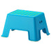 An image of an IKEA step stool in blue, featuring a sturdy and compact design that can be easily carried around the house for various tasks, ideal for use in outdoor spaces