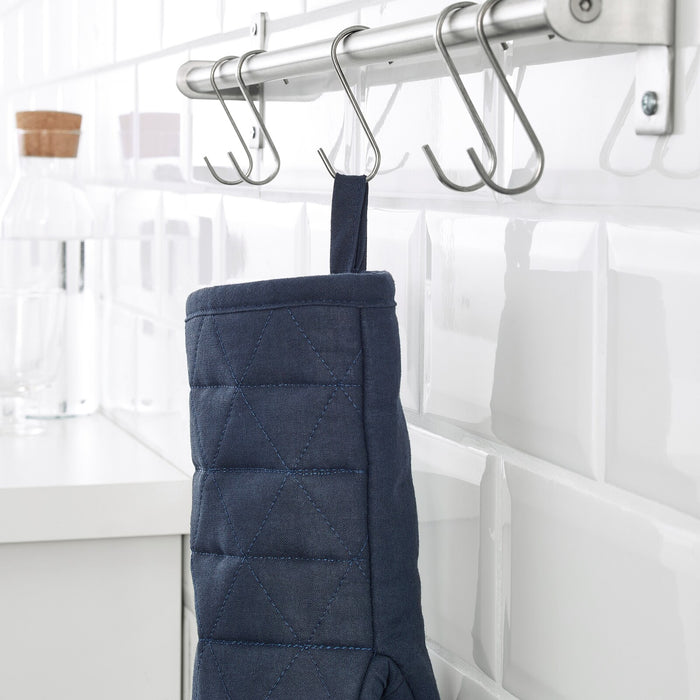 Stay cool, calm, and collected in the kitchen with this functional and stylish oven glove from IKEA, designed to make cooking and baking easier and safer 80370002